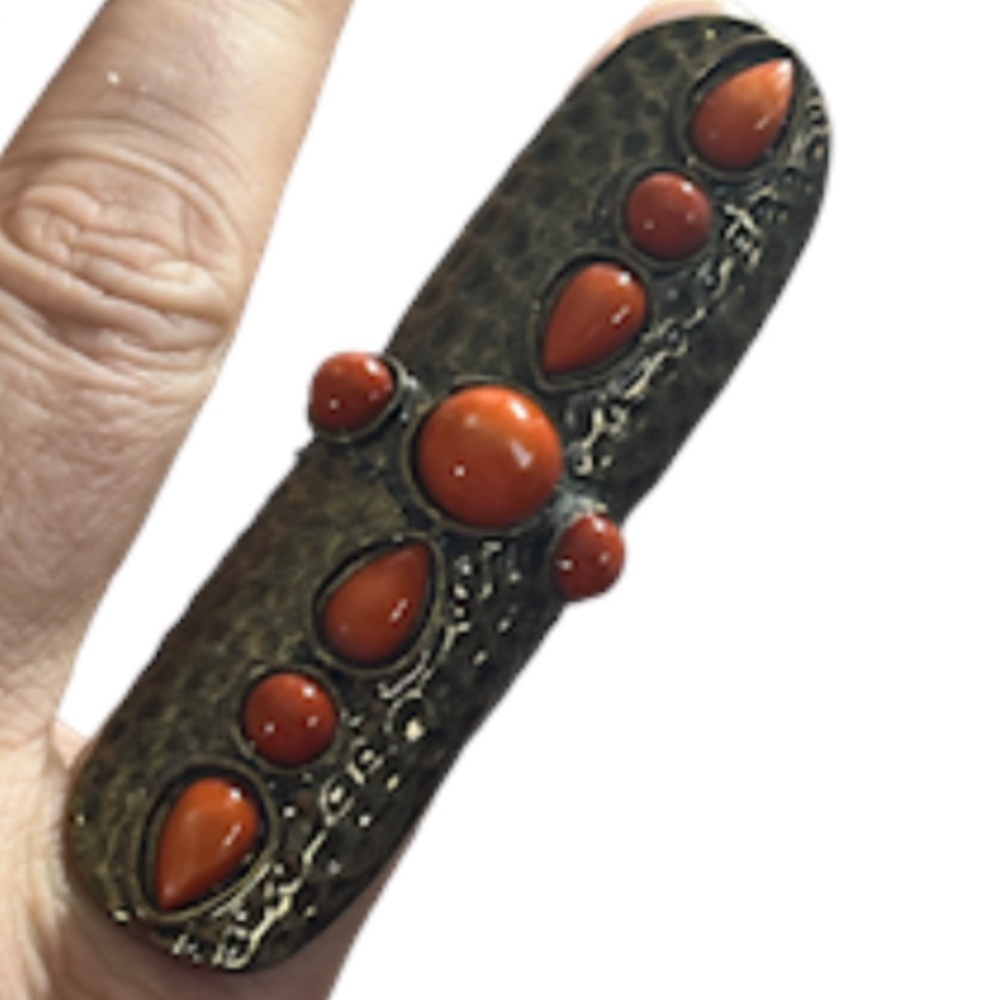 Elegant Hammered Ring with Red Accents